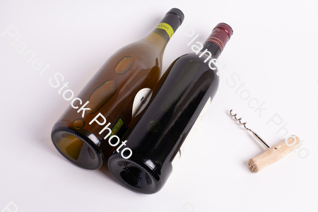 Two bottles of wine, with corkscrew stock photo with image ID: 56945669-1004-48ae-a943-0a309ab95d6a
