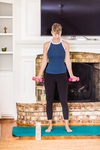 A young lady working out at home