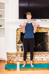 A young lady working out at home