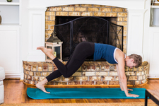 A young lady working out at home