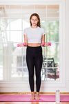 A young lady working out at home