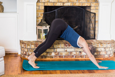 A young lady working out at home